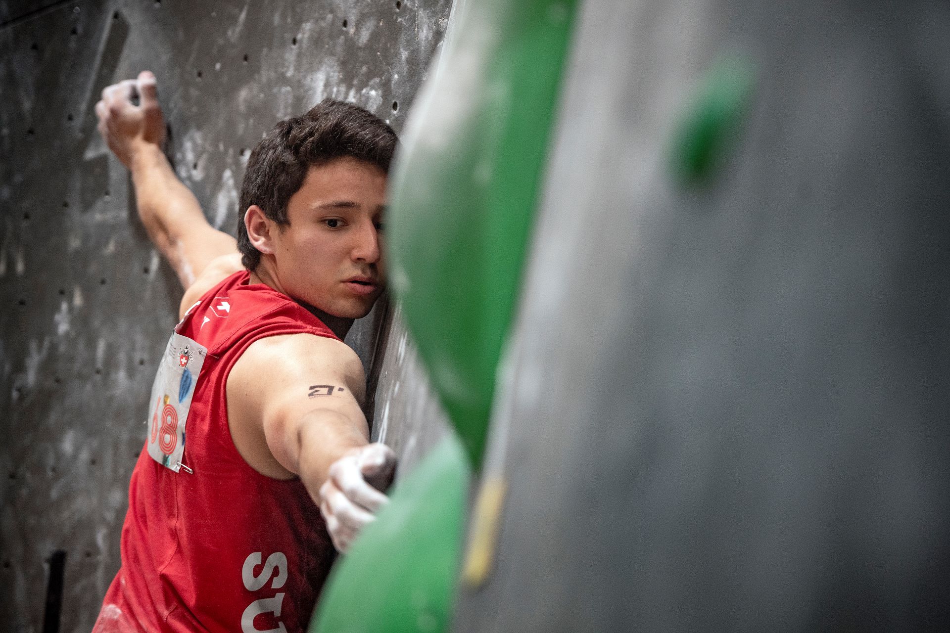woman climbing a wall
